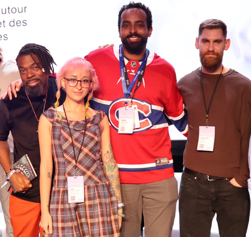 Team THIRI at Music Hackspace × MUTEK, Montreal. Four people; Dennison Blackett at left in orange trousers.